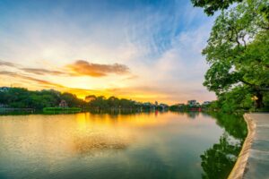 Hanoi Hoan Kiem Lake ( Ho Guom) or Sword lake in the center of Hanoi in cinematic sunset sky
